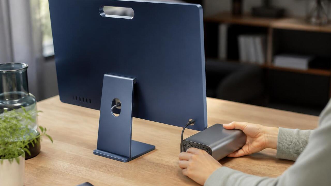 Apple запатентовала iMac с ручкой и съёмным блоком питания Apple запатентовала дизайн iMac с ручкой для пе...