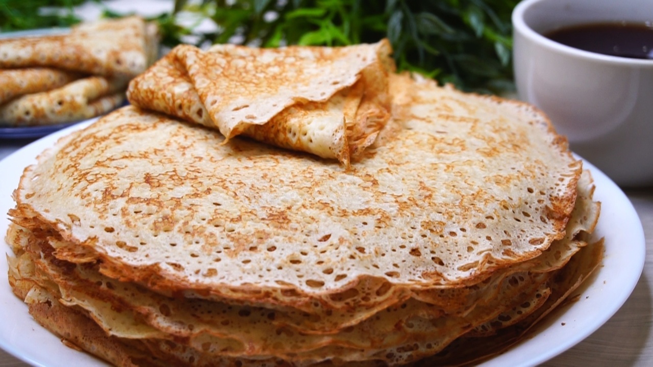 Гости обалдеют от этой вкуснятины: простой и быстрый рецепт тонких старорусских блинов на Масленицу Откройте для себя простой и быстрый рецепт тонк...